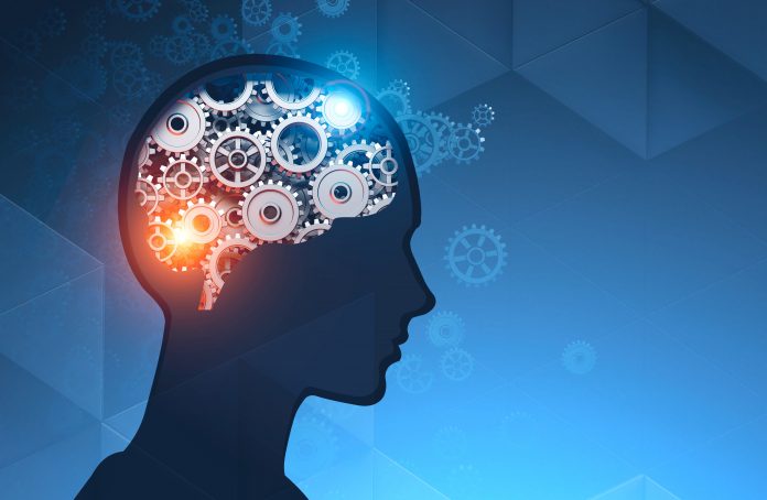 Man head silhouette with gear brain